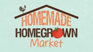 Reads Homemade Homegrown in a rustic font with a tomato in the center. A roof and rooster top the title.